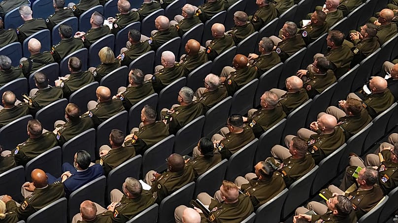 U.S. military senior leadership listen as President Donald Trump speaks at Marine Corps Base Quantico, Tuesday, Sept. 30, 2025 in Quantico, Va.