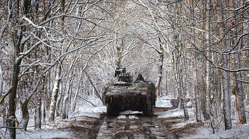 Soldiers from Jägerbataillon 91 drive the GTK Boxer through the snow-covered terrain at the Army Combat Training Centre in Gardelege, 28 November, 2023