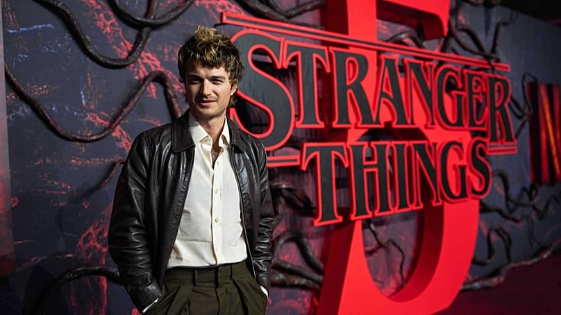 Joe Keery poses for photographers upon arrival at the Stranger Things Season 5 Premiere in London, Thursday, Nov. 13, 2025