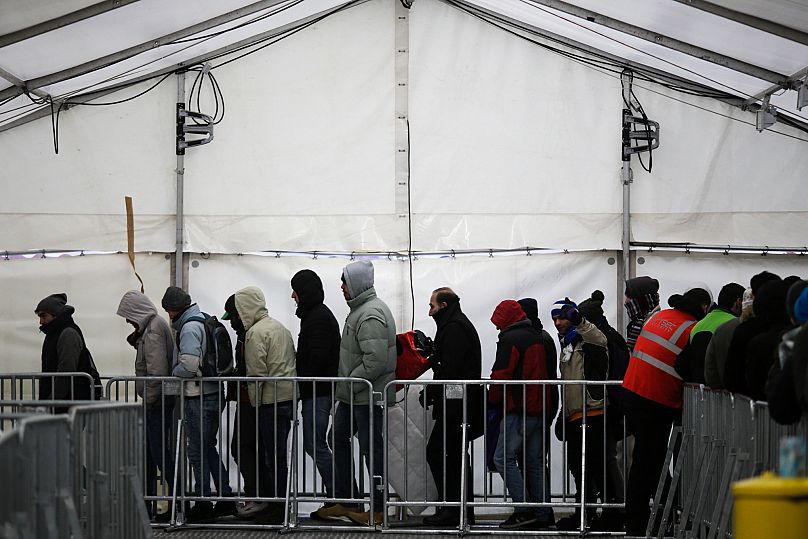Migrants and refugees at a registration centre in Berlin, 4 January, 2016