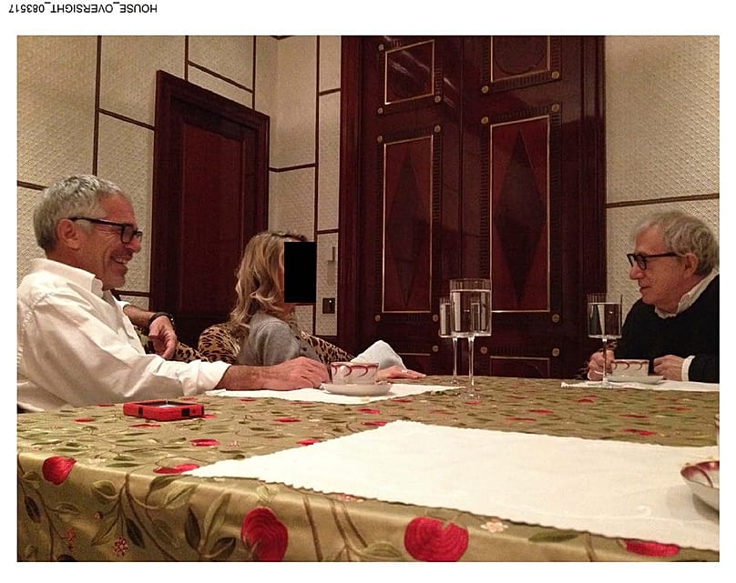 This undated, redacted photo released by Democrats on the House Oversight Committee shows Jeffery Epstein and Woody Allen.
