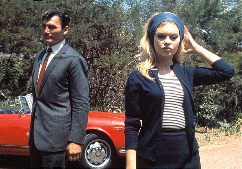 French actress Brigitte Bardot with actor Jack Palance during filming of the movie "Le Mepris" aka "Contempt", by Jean-Luc Godard, in Rome, Italy, May 1963.