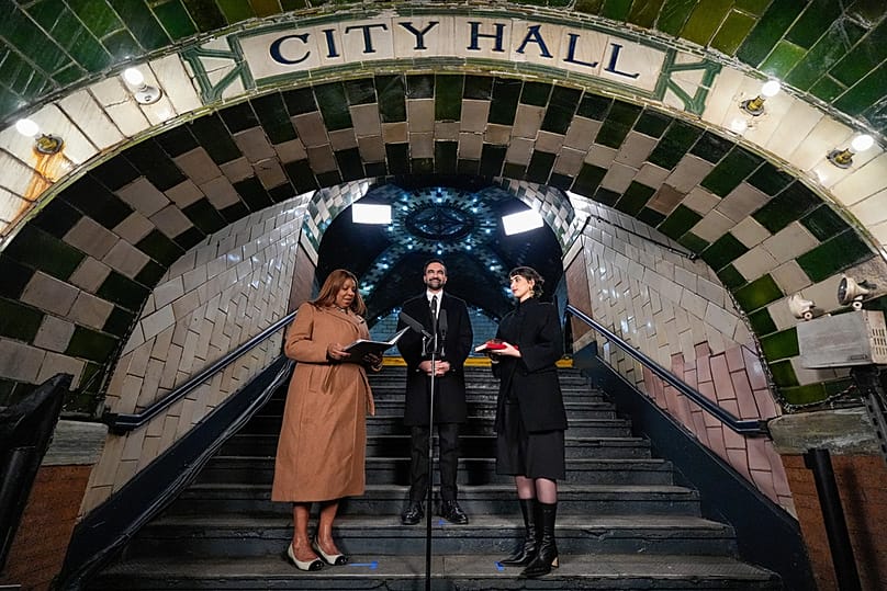New York Attorney General Letitia James administers the oath of office to mayor-elect Zohran Mamdani, as his wife Rama Duwaji looks on, Thursday, Jan. 1, 2026, in New York