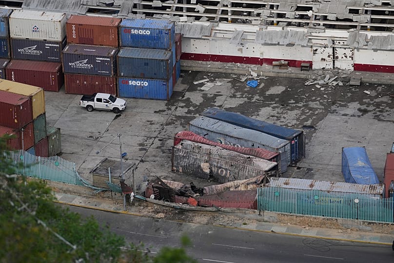 Destroyed containers lay at La Guaira port after explosions were heard in Venezuela, Saturday, Jan. 3, 2026