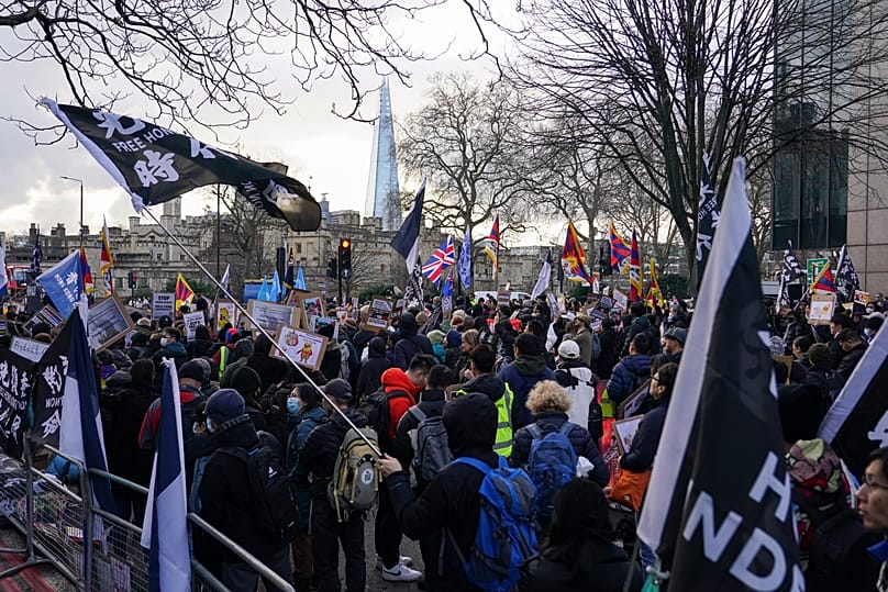 Demonstrators hold placards and flags as they attend a protest against the proposed Chinese embassy in London, 17 January, 2026