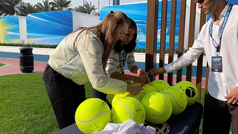 Elena Rybakina signs autographs for fans