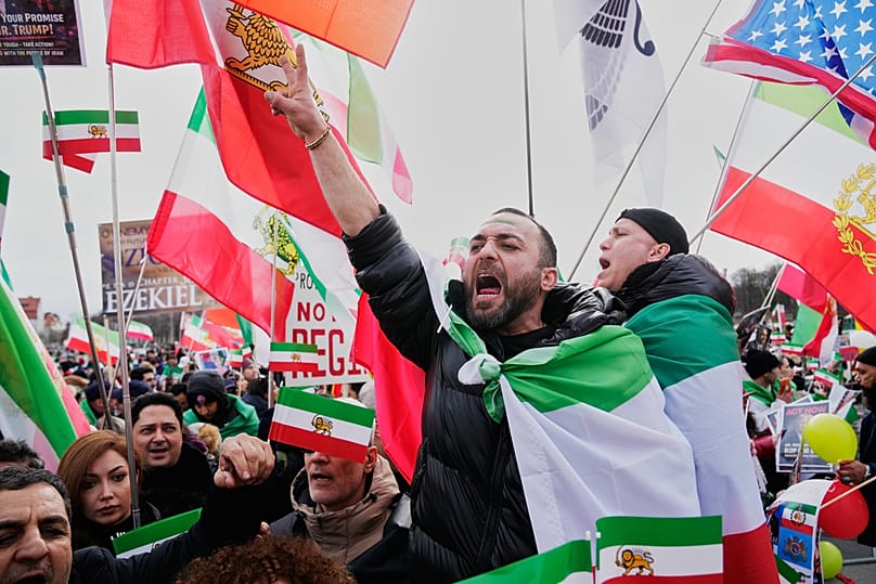Supports of Iran's exiled Crown Prince Reza Pahlavi attend a demonstration during the Munich Security Conference in Munich, Germany, Saturday, Feb. 14, 2026