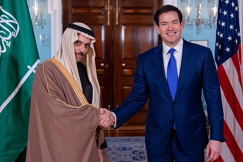Secretary of State Marco Rubio greets Saudi Arabia's Foreign Minister Faisal bin Farhan at the State Department, Wednesday, Jan. 7, 2026, in Washington.