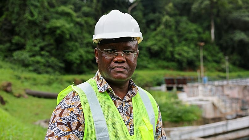 Maada Kpenge, managing director of Guma Valley water company, poses near the water treatment area in Western Area Peninsula National Park, Sierra Leone, July 2, 2025.