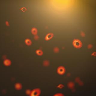 Konzeptgrafik: Kleine, frühe Schwarze Löcher; künstlerische Visualisierung.