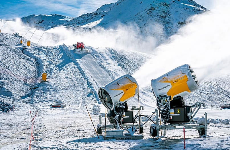 Snow cannons spray snow at the finish area of the new four-kilometre ski slope "Gran Becca", in Cervinia, Italy