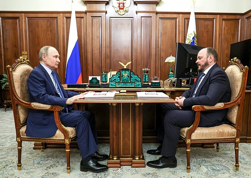 For the war chest: Russian President Vladimir Putin meets Andrei Guryev, Chairman of the Association of Russian Fertiliser Manufacturers, in the Kremlin in 2025.