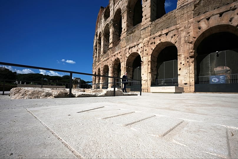 The new outdoor space created with travertine marble around the Colosseum during its inauguration in Rome, Tuesday, March 17, 2026