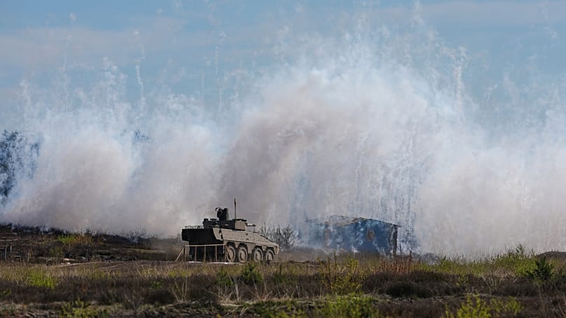 Bundeswehr troops demonstrate their capabilities during a visit of German Chancellor Friedrich Merz at the Bundeswehr base in Munster, Germany, Thursday, April, 30, 2026