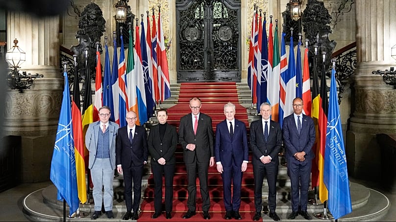 Bart De Wever, Luc Frieden, Mette Frederiksen, Friedrich Merz, Jonas Gahr Støre and Jean-Charles Ellermann-Kingombe at the North Sea Summit in Hamburg, Jan. 26, 2026