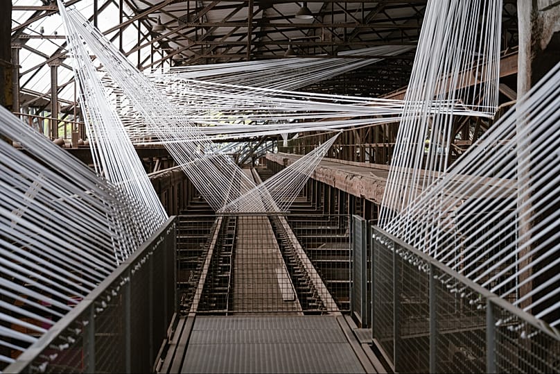 "Transit der Erinnerung", Transit of Memory, by artist Vortex-X on display at the former ironworks Voelklinger Huette as part of the Urban Art Biennale in Germany.