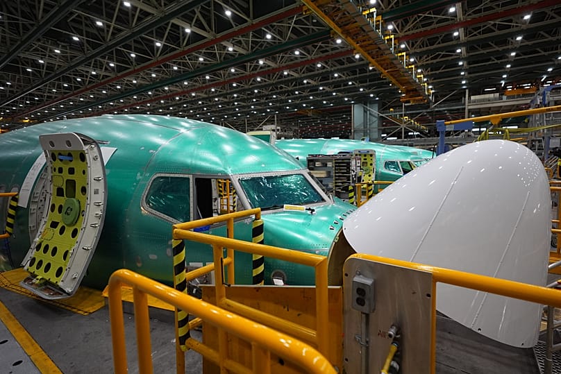 Boeing 737 MAX airplanes fuselages are seen on the final assembly line at Boeing's factoryApril 15, 2026, in Renton, Washington. (AP Photo/Lindsey Wasson)