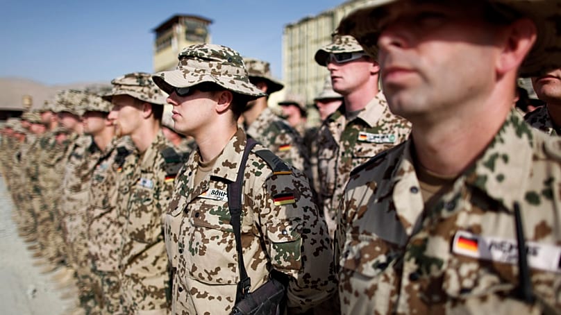 ARCHIVE - German ISAF soldiers line up at their camp in Feysabad, east of Kunduz, Afghanistan, on September 19, 2009