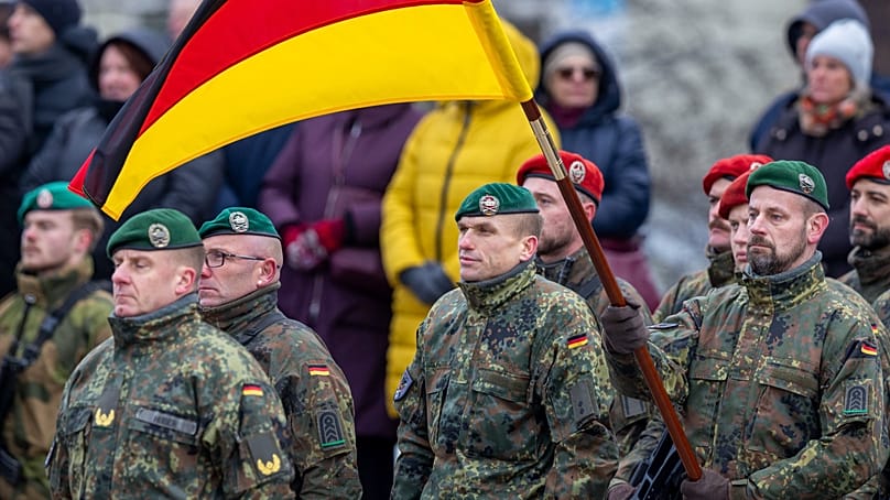 Soldiers attend a ceremony marking the 106th anniversary of the Lithuanian military, on Armed Forces Day in Vilnius, Lithuania, Nov. 23, 2024.