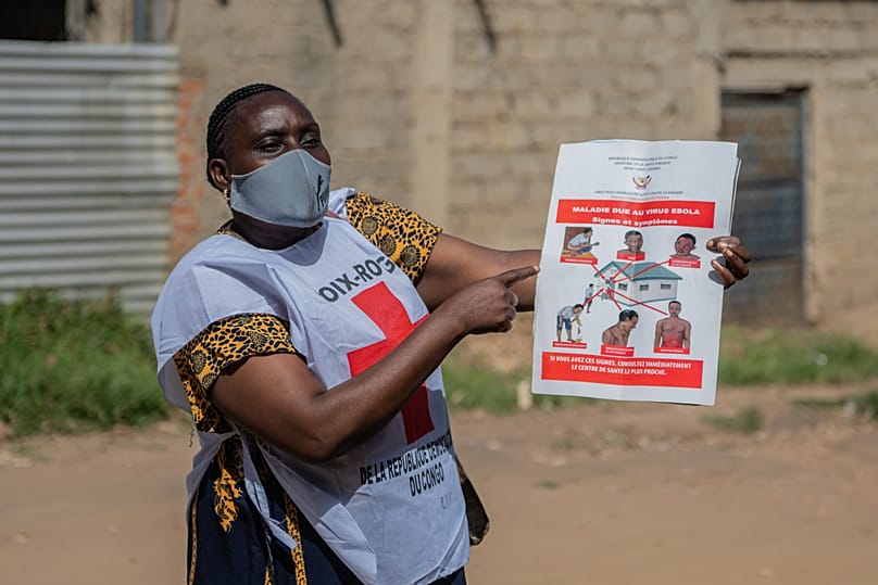 A Red Cross volunteer on a house-to-house sensitisation campaign amid the Ebola outbreak in Bunia, 25 May, 2026