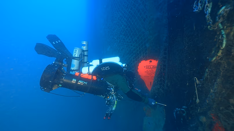 A Ghost Diving volunteer removing an abandoned fishing net from the wreck