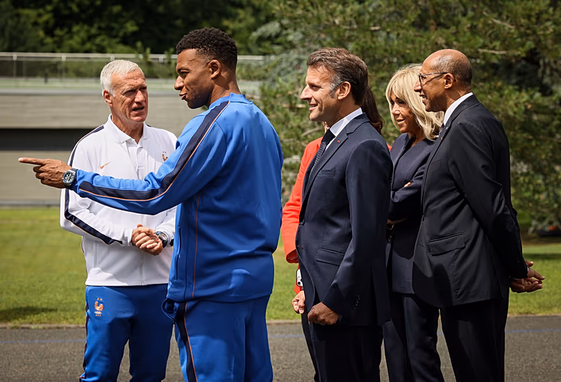 France's head coach Didier Deschamps, France's Kylian Mbappe, France's President Emmanuel Macron, Brigitte Macron and France's Football Federation's President Philippe Diallo