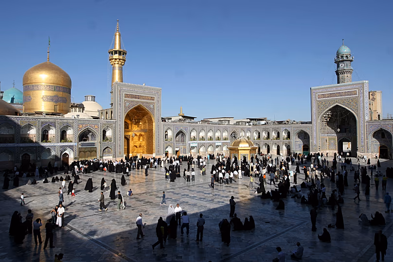 FILE: Pilgrims visit the mausoleum of Imam Reza, the 8th Shiite Imam and grandson of the Prophet Mohammad, in Mashhad, 11 August 2008