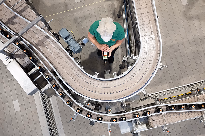 A machine operator stands in the bottling plant of herbal liqueur manufacturer Jägermeister in Kamenz, 23 April, 2026