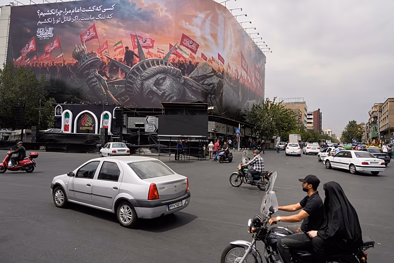 A billboard depicting a fallen Statue of Liberty in Tehran, 3 August, 2026