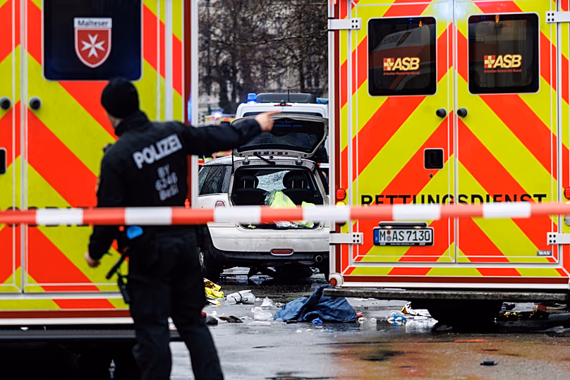 Emergency services attend the scene of an accident after a driver hit a group of people in Munich, 13 February, 2025