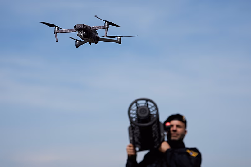 A police officer poses after the opening ceremony of a centre for drone expertise and defence in Erding near Munich on Monday, 4 May 2026.