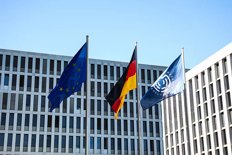 The flags of the European Union, Germany and the Bundesnachrichtendienst (BND) are seen in Berlin, 11 September, 2025