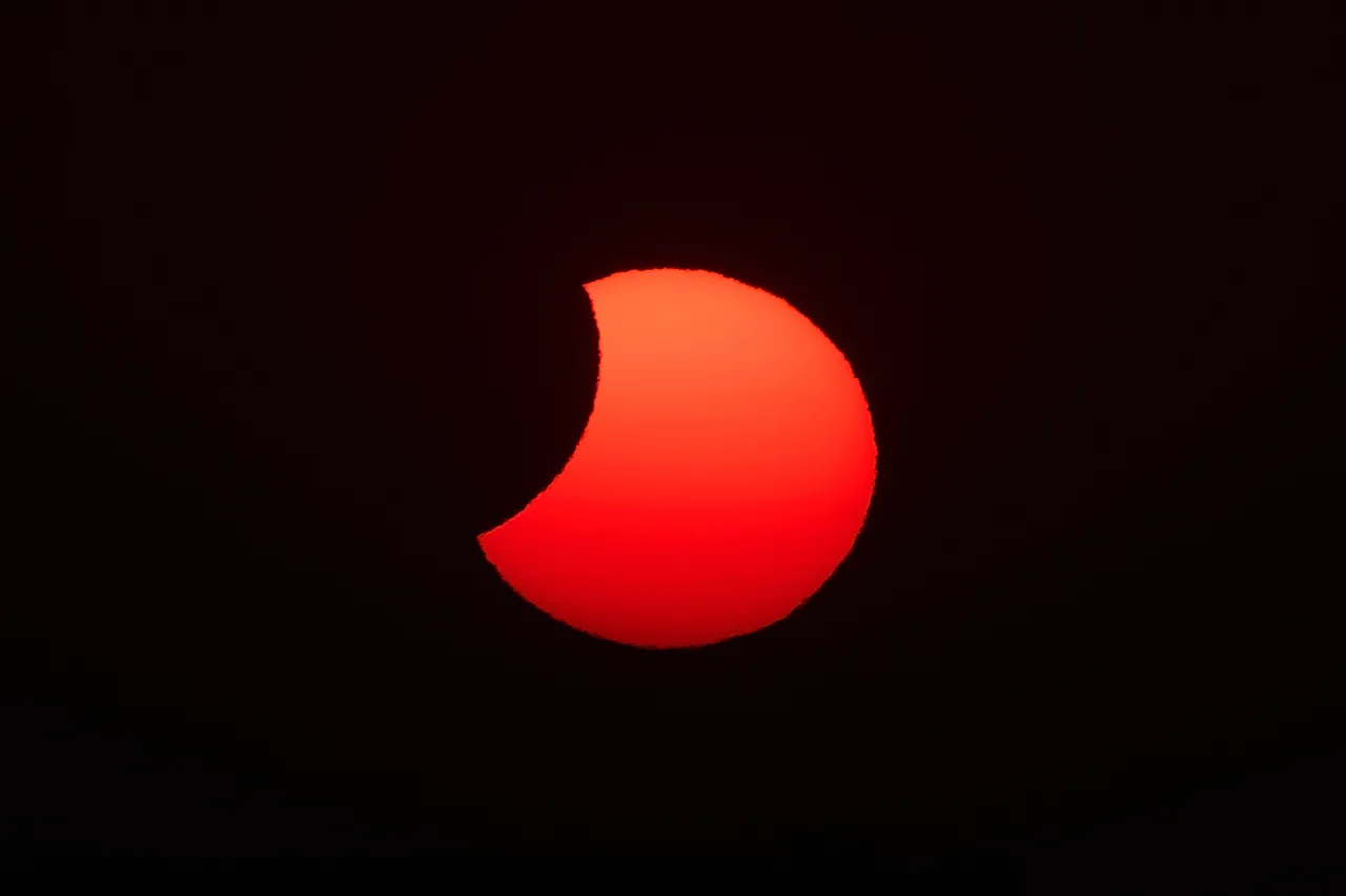 The moon moves out of the sun during a total solar eclipse is seen from Berlanga de Duero, central Spain