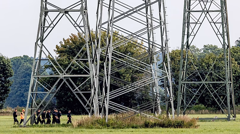 Police search the area around the extra-high-voltage power lines near the Turnow-Preilack substation and the Jänschwalde power plant in Preilack, 3 September, 2026