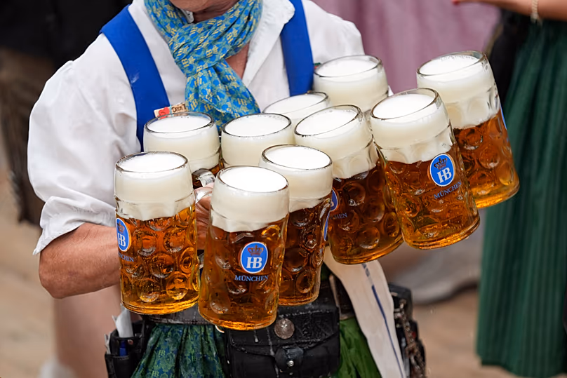 Waitress carrying beer steins in the Hofbräuhaus beer tent